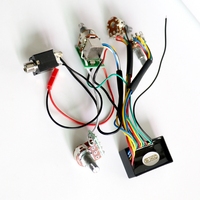 Préampli de basse actif Donlis avec circuit de préampli et égaliseur 2 bandes, permettant de basculer entre les micros de basse passifs et actifs