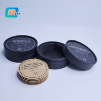 Emballage cylindrique en carton argenté de luxe personnalisé avec plateau en EVA pour coffret cadeau de sous-verres à whisky