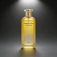 Vente en gros de flacons de parfum en verre transparent cylindriques personnalisés de 50 ml, 70 ml, 100 ml avec atomiseur et pompe