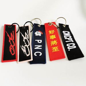 Wholesale Customized Remove Luggage Tag <b>Label</b> Before Embroidery Keyring Flight for logo Woven Keychains - Product Image 4