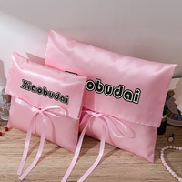 Sac d'enveloppe d'emballage de perruque de cheveux de satin rose imprimé de logo personnalisé pour l'expédition et le stockage cosmétique pochette cadeau de flexographie