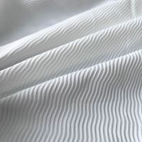 Tissu de base 100% polyester à rayures ondulées imprimées numériquement en 3D, grand jacquard élégant et résistant à l'abrasion