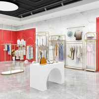 Tables gigognes pour magasin de vêtements en boutique Présentoir mural en jean pour magasin de vêtements