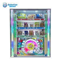 Machine d'arcade de distribution de prix rotative RaiseFun – Jeu de la chance avec distribution de boîtes mystères, collations et cadeaux – Accepte les pièces de monnaie, l'argent liquide et les cartes de crédit