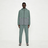Ensemble de sport deux pièces personnalisé en nylon pour homme : survêtement respirant avec veste à capuche zippée et pantalon de jogging