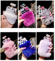 Étui de téléphone portable en fourrure de lapin douce et chaude avec bouteille de parfum en diamant incrusté de strass de luxe pour iPhone