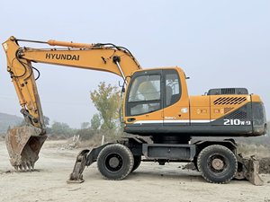 Excavatrice sur pneus Hyundai 210W-9 150-7 150 d'occasion à vendre, importée, originale/de construction, Hyundai 210W-9 150-7 150 d'occasion - Product Image 2