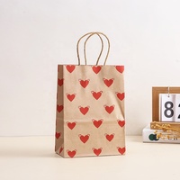 Caja de impresión de stock personalizado Venta caliente barato mango plano Día de San Valentín amor corazón Kraft regalo bolsas de papel