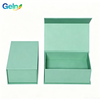 Boîte cadeau magnétique style livre en carton gris, couleur unie vert menthe, surface vierge, personnalisation du logo, commande en gros