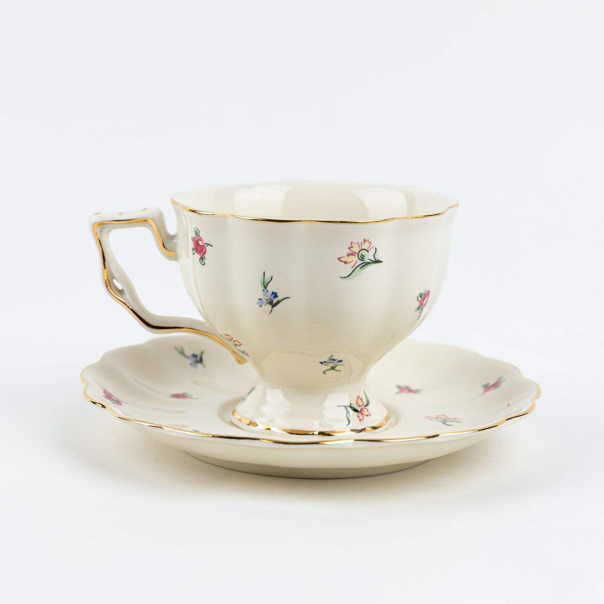 Cup with saucer