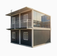 Maison conteneur préfabriquée modulaire en acier de 20 pieds avec mur rideau en verre pour bureau, studio, jardin, extérieur