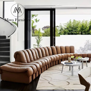 Canapé en cuir créatif de forme spéciale, design italien, arc serpentin, salon, hôtel, canapé modulaire central - Product Image 6