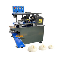Machine à brioches à viande de porc juteuse entièrement automatique à la main machine à fabriquer des petits pains au pau momo faisant la machine à boulettes