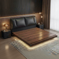 Cama matrimonial king size con cajones, de madera maciza, estilo moderno de mediados de siglo, con estructura de suelo y almacenamiento.