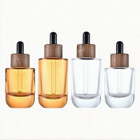 Botol Serum Perawatan Kulit Mewah Unik dari Kaca Desain Baru Kustom 30ml 1oz 50ml, Botol Kosmetik Kosong untuk Minyak Wajah dan Rambut dengan Pipet