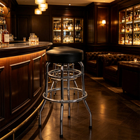 Tabouret de bar au design simple, structure métallique, assise en cuir souple pour salon