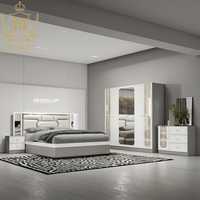 Ensemble de chambre à coucher moderne haut de gamme King-Size avec armoire en bois peint à 6 portes et fonction massage, mobilier de chambre de luxe