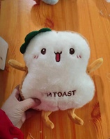 Coussin en peluche tendance en forme de pain grillé, en polyester haute densité, pour machine à griffes, avec logo personnalisé, article dropshipping