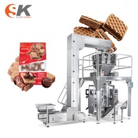 Machine d'emballage alimentaire automatique multifonctionnelle pour chips de pommes de terre, maïs, frites, snacks, bonbons, noix, dattes, céréales et granulés