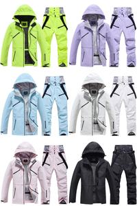 Trajes de esquí Deportes de invierno Snowboards Chaqueta impermeable a prueba de viento y pantalones Set Ski Snow Wear <span class=keywords><strong>para</strong></span> Mujeres Hombres - Product Image 4