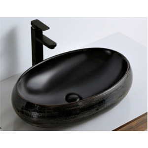 Lavabo de comptoir en céramique noire Ouni 600x405mm, ovale, bicolore, brossé, pour salle de bain d'hôtel - Product Image 1