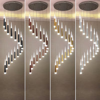 Lustre LED suspendu réglable pour les escaliers dans les bâtiments duplex, les villas et les greniers. Disponible en or/noir/blanc.