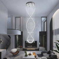 Lampe de luxe longue goutte de pluie spirale cristal chaîne lustre pour escalier foyer entrée résidentiel