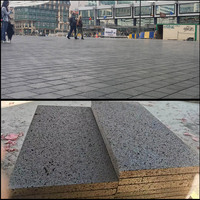 Carreaux de revêtement de mur intérieur extérieur en pierre de travertin noir de luxe naturel pour la décoration d'hôtel