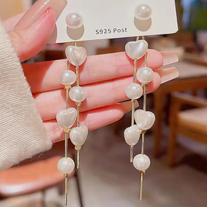 Women's Modern Daily Wear Gold-Plated Round Pearl <b>Heart</b> Stud Earrings Fashion Design With <b>Sweet</b> Long Tassel Made From Alloy - Product Image 1