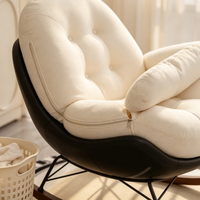 Fauteuil à bascule Egg Shell au design moderne, chaise longue en PU noir, tissu capitonné crème, support métallique double triangle