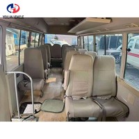 Autobus Coaster à essence économiques vendus en Chine, dotés de 23 sièges fixes et de 6 sièges pliants