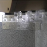 Système de commande par cordon pour accessoires de rideaux manuels, idéal pour les stores à double couche