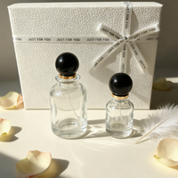Flacon de parfum en verre cylindrique d'inspiration vintage avec pulvérisateur à pompe circulaire, atomiseur à pression, vente en gros, directement de l'usine