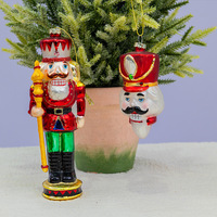 Ornement de Noël en verre artisanal de haute qualité, fantaisie et personnalisé, en forme de casse-noisette avec design à sequins, tête de poupée, boule décorative