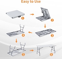 Table de salle à manger pliable moderne en plastique blanc de 1,5 mètre avec poignée de transport pour une utilisation intérieure et extérieure