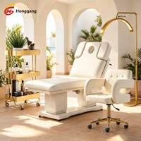 Table de massage entièrement électrique réglable, base en métal de luxe, couleur personnalisable, lit de spa pour salon de beauté
