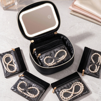 Boîte de rangement à bijoux moderne en PU avec miroir, sac de voyage portable pour colliers, boucles d'oreilles, bagues, petit sac carré à fermeture éclair, sac à bijoux