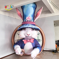 Lapin gonflable de lapin de personnage de dessin animé gonflable de décoration de fête du pays des merveilles avec l'horloge