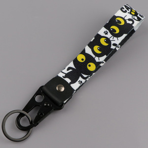 Correa de poliéster mate con estampado de pata de gato de dibujos animados en blanco y negro, clip de águila, llavero de gatito, regalo para amantes de los gatos - Product Image 2