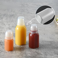 30ml 60ml 100ml prix usine bouteille plate en plastique bondée de confiture bouteille de miel de sauce à presser avec couvercle à vis valve en silicone