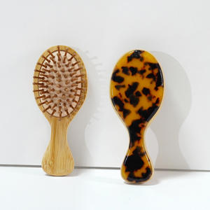 <span class=keywords><strong>แปรง</strong></span>หวีผมแบบเข็มด้ามไม้ไผ่สำหรับใช้ในบ้านหวีป้องกันไฟฟ้าสถิตย์เบาะอากาศทรงรีรีแบบ2025ใหม่ออกแบบได้ตามที่ต้องการ - Product Image 1