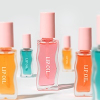 Huile phosphorescente de traitement des lèvres aux fruits de pastèque colorée de haute qualité avec son propre logo Lipoil Balm Brillant à l'huile pour les lèvres hydratant personnalisé en gros