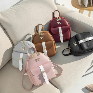 Mini sac à dos <span class=keywords><strong>femme</strong></span> nouveau style 2026, couleur unie, fermeture éclair, style décontracté, sac d'école polyvalent, sac à dos classique petit format pour le commerce international - Product Image 1