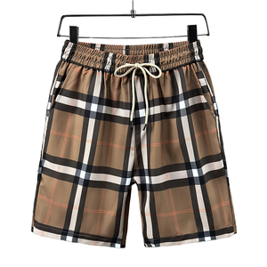 Shorts en toile respirants pour hommes, taille mi-haute, tissés, unis, décontractés, pour l'été et la plage, avec cordon de serrage – Vente en gros - Product Image 1