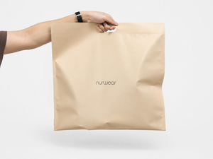 Waterproof Kraft Paper Shipping Bags - Custom Printed Die Cut Handle Self Seal Bags for Clothing for Clothing Boutique Packaging - Product Image 1