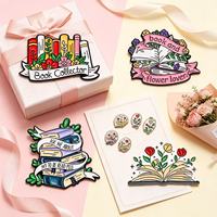 Broches émaillées en forme de livre et de fleur pour les amateurs de lecture, badges métalliques personnalisés pour sacs à dos et vêtements, cadeau littéraire