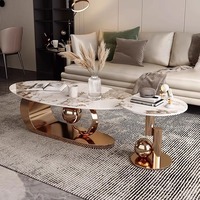 Table basse ovale en métal et pierre, style italien, luxe léger, pour salon, petit appartement, design simple haut de gamme