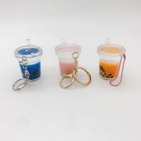 Porte-clés en acrylique en gros avec bulle de thé flottante et logo personnalisé imprimé pour cadeaux souvenirs de marque