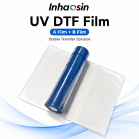 Film de transfert UV DTF haute durabilité pour impression d'autocollants sur bouteilles, tasses et coques de téléphone – Rouleau de film AB à adhérence durable pour la vente directe