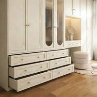 Armoire de chambre moderne avec portes en MDF, coiffeuse et tiroirs, design portable